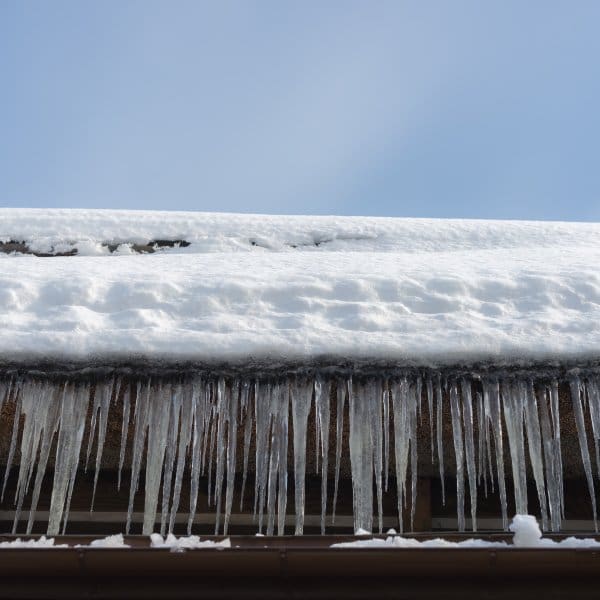 Ice dams and Icicles on a Roof
