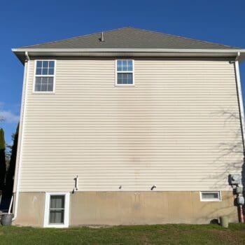 A Pennsburg, PA home before getting a stucco to James Hardie Board & Batten siding transformation - 5